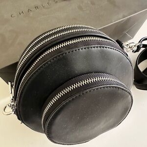 Charles & Keith black round shoulder bag silver zipper and pulls